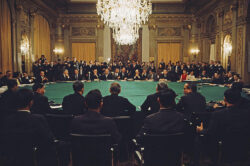 View of diplomats and politicians from the United States, South Vietnam and North Vietnam sitting around the newly installed round table for initial talks, part of the concerted efforts to reach agreement on the Paris Peace Accords to end the conflict in the Vietnam War, in Paris, France on 25th January 1969.